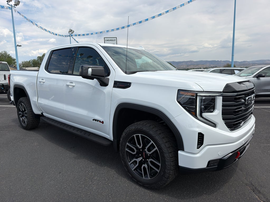 2026 GMC Sierra 1500 AT4 in Summit White — front three-quarter view